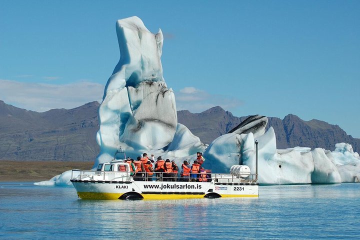 Jökulsárlón Glacier Lagoon with amphibious boat tour, blue icebergs floating in glacial water